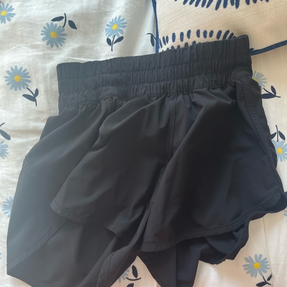 BLACK LULULEMON SHORTS SIZE 4!